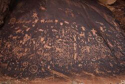Petroglyphs at Newspaper Rock, Canyonlands carved into desert varnish.jpg