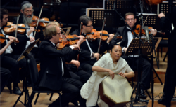 HE XUNTIAN Whirling Udumbara II, He-drum Percussionist Ehesuma and The Israel Symphony Orchestra in 2014.png