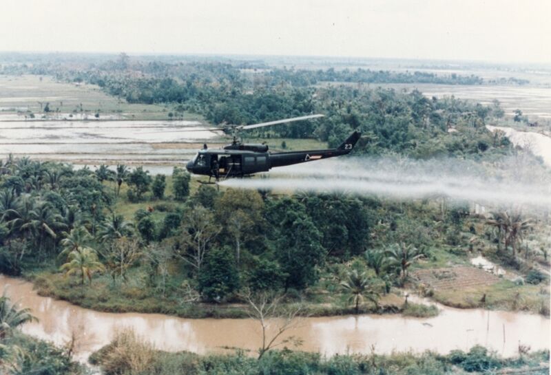File:US-Huey-helicopter-spraying-Agent-Orange-in-Vietnam.jpg