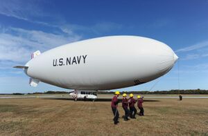 Handlers prepare to launch the U.S. Navy MZ-3A manned airship for an orientation flight from Naval Air Station Patuxent River, Md., on 131106-N-PO203-532.jpg