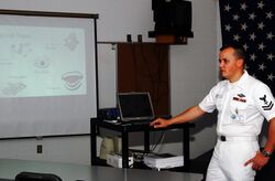 US Navy 070719-N-2143T-002 Hospital Corpsman 2nd Class Joseph Garling, assigned to Naval Hospital Bremerton, teaches Sailors about anger management at the Bangor Naval Brig Correctional Custody Unit.jpg
