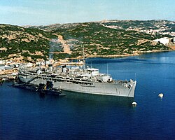 USS Orion (AS-18) anchored at Naval Support Activity La Maddalena, Italy, on 1 September 1983 (6369543).jpg