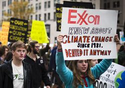 "Exxon Knew" sign on a BLM protest in Washington, DC (2015).jpg