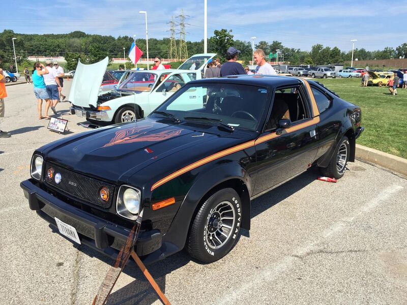 File:1978 AMC AMX at AMO 2015 meet in black with gold stripe 1of3.jpg