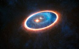 Artist’s impression of the double-star system GG Tauri-A.jpg