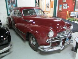 R. E. Olds Transportation Museum July 2018 31 (1942 Oldsmobile 98 Custom Cruiser Club Sedan)1.jpg