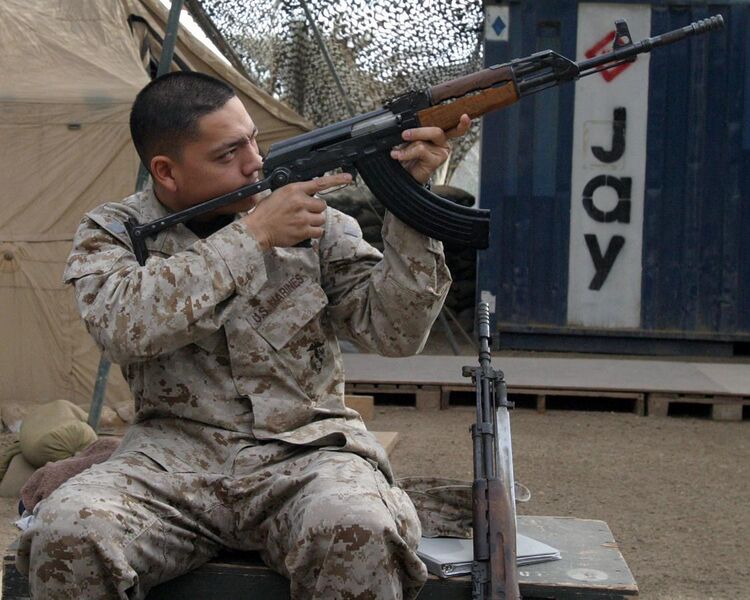 File:USMC checking rifle.JPEG