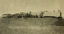 Photo of an armoured CGR 3rd Class 4-4-0 1889 locomotive derailed on 12 October 1899 during the first engagement of the Second Boer War at Kraaipan