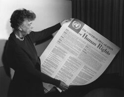 photograph of Eleanor Roosevelt holding the Universal Declaration of Human Rights