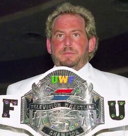 Herb Abrams holding the UWF SportsChannel Television Championship at New York Penta in May 1991.jpg