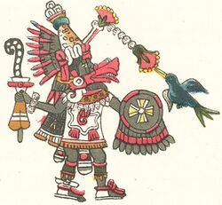 a figure in an Aztec style carrying a round shiled with a symbol similar to a Maltese cross.