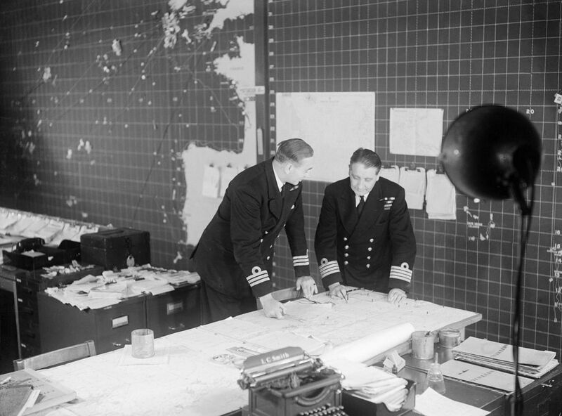 File:Staff officers discuss convoy movements in the Operations Room at HQ Western Approaches Command, Derby House, Liverpool, September 1944. A25742.jpg