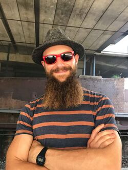 Hipster, Newtown, hipster beard, retro watch, colourful glasses.jpg