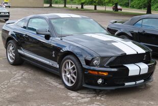 2008 Ford Mustang Shelby GT500 Coupe, front right, 07-02-2023.jpg