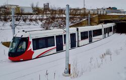 Confederation Line train testing near St. Laurent station, January 2018.jpg