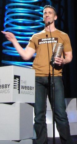 Dan Savage receives Webby Award 01 (cropped to Savage).jpg