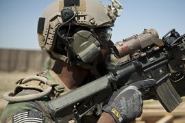 A U.S. Marine with a Marine special operations team assists with security during the construction of an Afghan Local Police (ALP) checkpoint in Helmand province, Afghanistan, March 30, 2013 130330-M-BO337-085.jpg