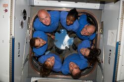 STS-131 crew members in ISS Cupola.jpg