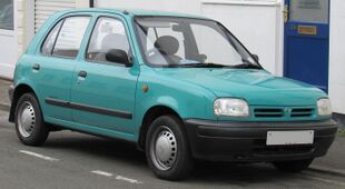 A small five-door car with a two-box body style and steel wheels and door mirrors