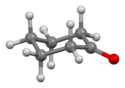 Ball-and-stick model of cyclohexanone viewed side-on, showing the non-planar conformation