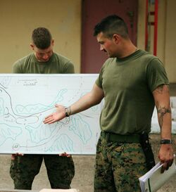 Sergeant Daniel Smith, USMC, conducts a tactical decision game.jpg