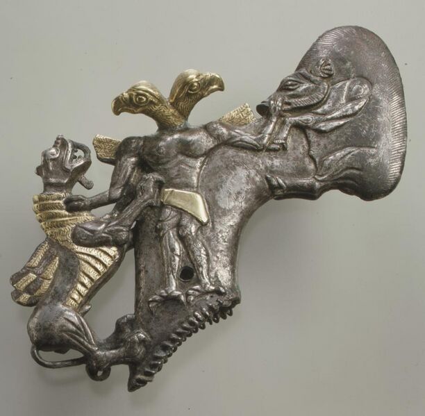 File:Shaft-hole axe head with bird-headed demon, boar, and dragon MET 1982.5.jpg