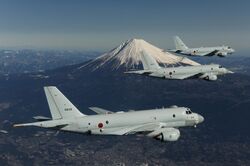 3 JMSDF Kawasaki P-1 in flight with Mount Fuji in the background.jpg