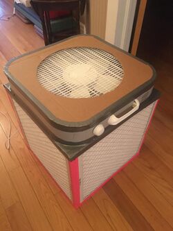 The Corsi-Rosenthal Box air filtration unit is an inexpensive air purifier constructed from a box fan, furnace filters and duct tape