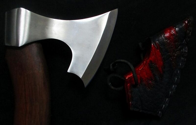 File:Masterpiece of craftsmanship - Franziska forged in modern Tomahawk shape design from cannon steel from the Leopard I battle tank - axe style made of a more than 150-year-old walnut tree.jpg
