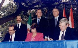 President Bush, Canadian Prime Minister Brian Mulroney and Mexican President Carlos Salinas participate in the... - NARA - 186460.jpg