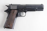 Colt M1911 bakside (6825680966).jpg