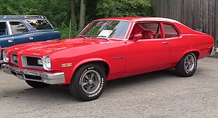1974 Pontiac GTO coupe, front left (Cruisin' the River Lowellville Car Cruise, July 17, 2023).jpg