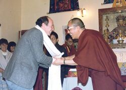 R Adam Engle receiving ceremonial scarf from Dalai Lama, Dharamsala, India, 1987.jpg