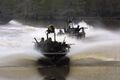 US Navy 040421-N-0000R-002 Special Warfare Combatant Crewmen (SWCC) assigned to Special Boat Team Twenty-Two demonstrate the new Special Operations Craft-Riverine (SOC-R).jpg