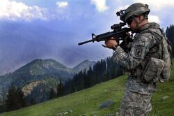 ISAF soldier looking for enemy positions in Kunar Province of Afghanistan.jpg