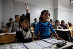 Syrian refugee children in a Lebanese school classroom (15101234827).jpg