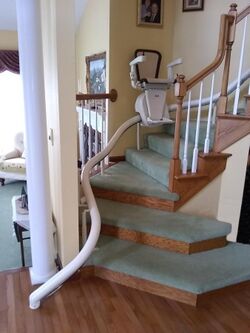 A curved stair lift