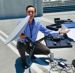Steve Jurvetson with Starlink user terminal.jpg