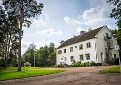 A white villa that is a part of Sandvik Coromant
