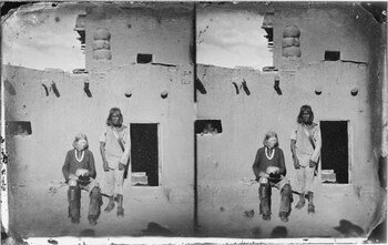 The man seated left is a Zuni with albinism. The Zuni people and other indigenous tribes of the American Southwest have a very high incidence of albinism.[34]