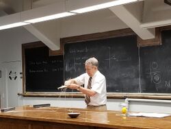 Professor Christ demonstrating that the fundamental group of SO(3) is Z2.jpg