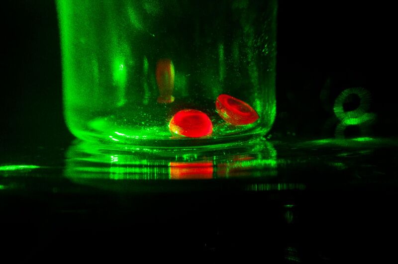 File:Artificial ruby hemisphere under a monochromatic light.jpg