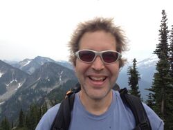 David Baker at the summit of Spark Plug Mountain, Washington, July 31, 2013