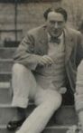 Photograph of Desmond MacCarthy sitting on steps, from 1912