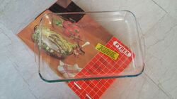 A clear, rectangular glass dish sitting on top of its original 1980s–1990s box.
