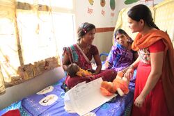 Teaching the importance of breastfeeding in India (8806268443).jpg