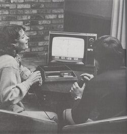 Two people playing a Fairchild Channel F.jpg