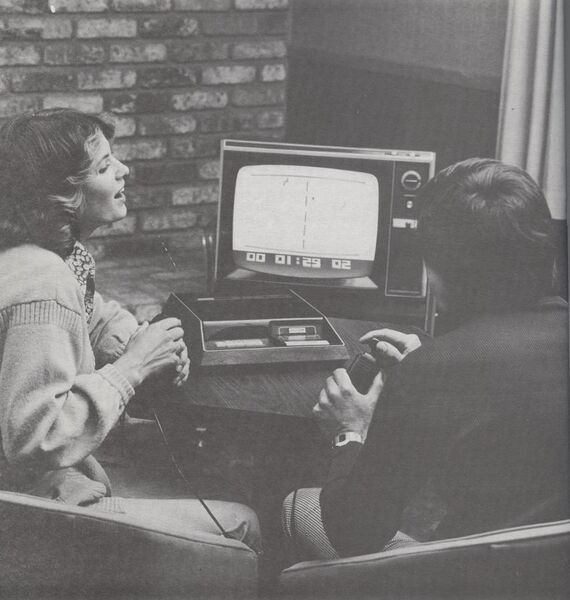 File:Two people playing a Fairchild Channel F.jpg