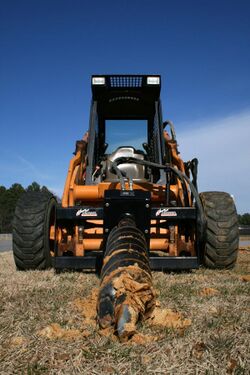 2009-02-23 Skid steer with extreme duty auger.jpg