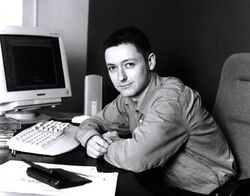 Man sitting at a computer desk